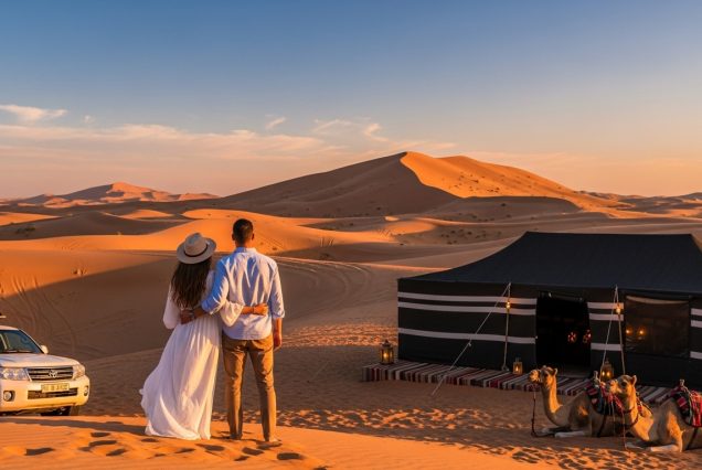 Couple enjoying a romantic desert sunset in Dubai